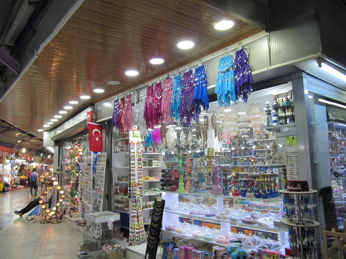 Market in Turkey. Belly dancing costumes are quite popular.